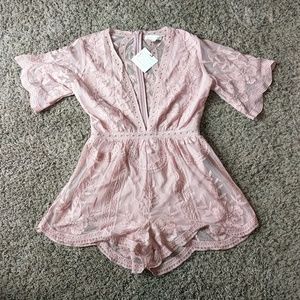 ADORABLE deep v neck romper!